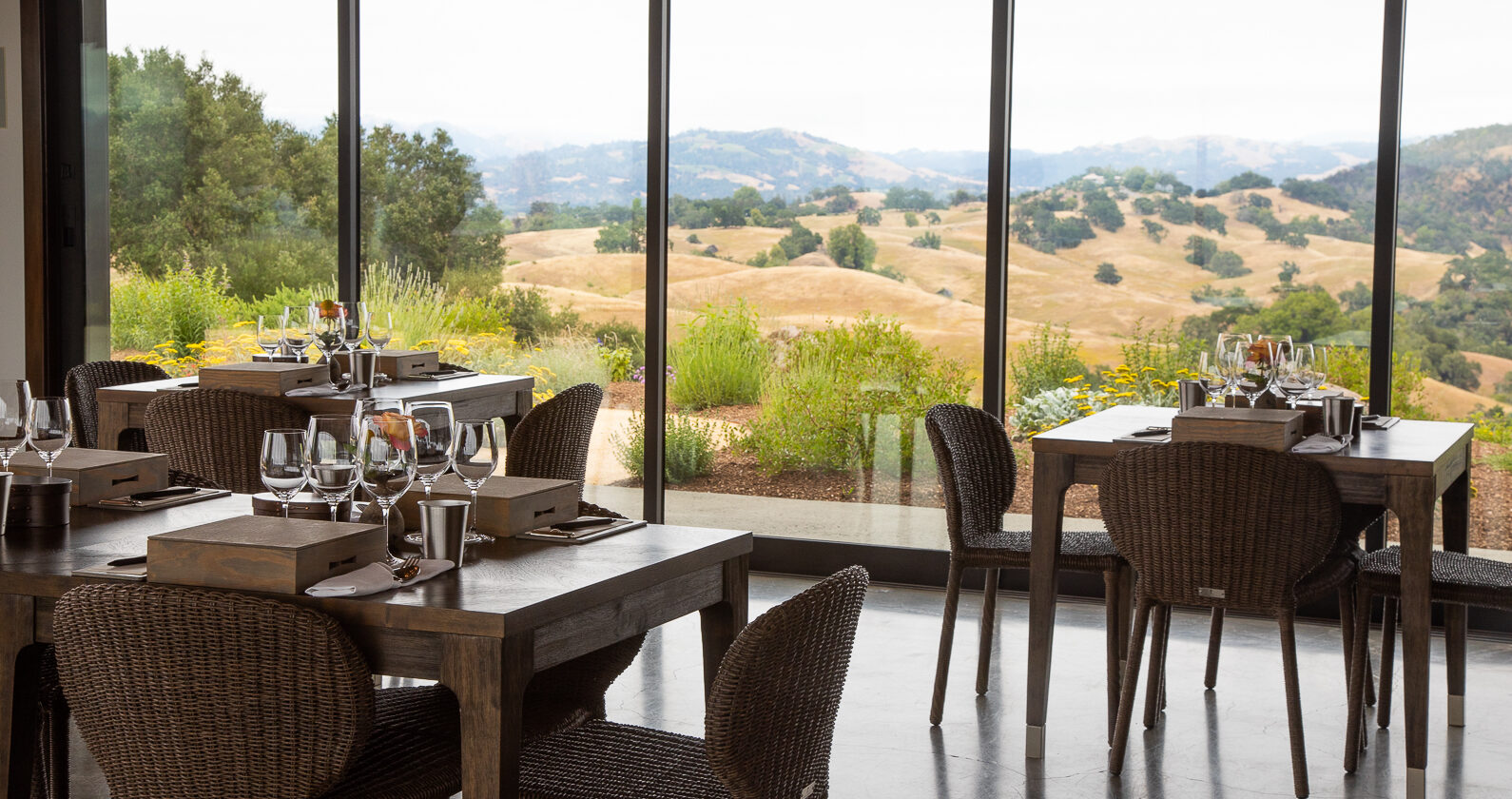 view of tables and chairs in glass pavilion