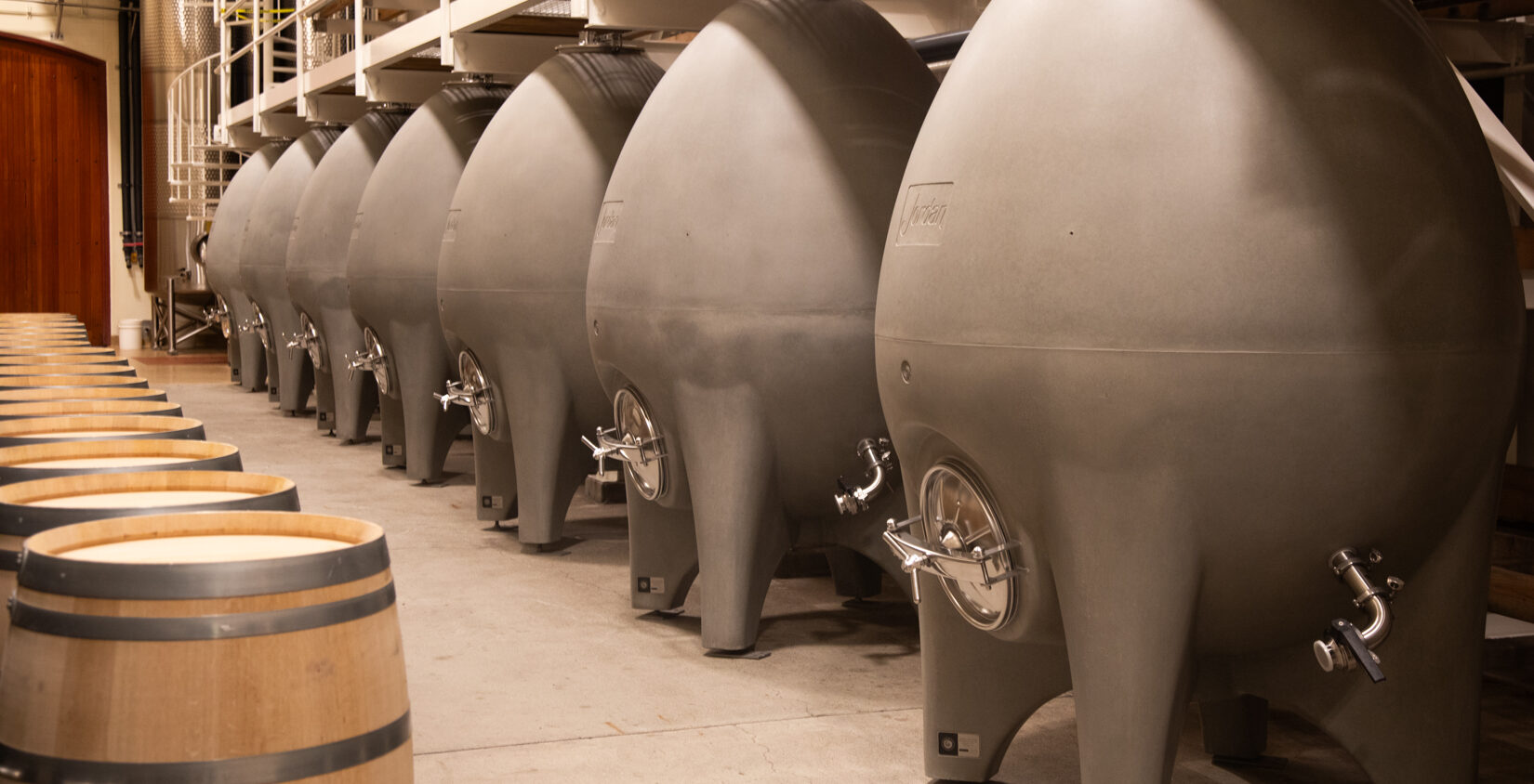 row of concrete eggs down the barrel room